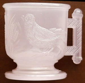 EASTLAKE bird mug in pink alabaster or pink clambroth, made by Atterbury & Company, Pittsburgh, circa early to mid-1880s.