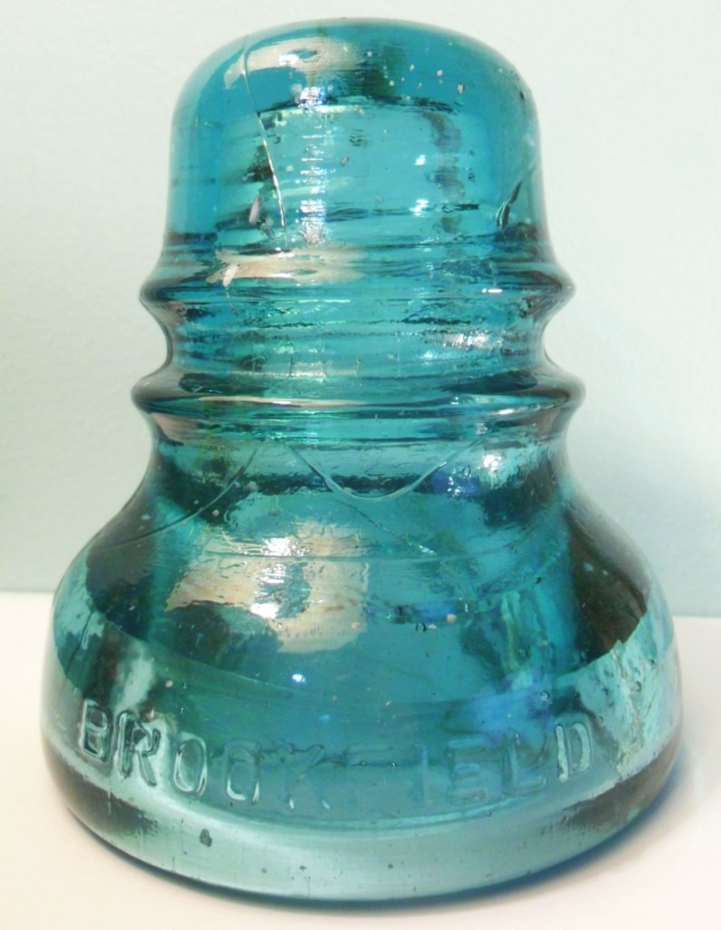  CD 152 Brookfield -made glass electrical telegraph insulator (type made c. 1911-1921) in aquamarine colored glass.