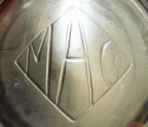 M A Co within diamond (on base of clear glass shaving mug). This is of uncertain date, but possibly the 1900-1930 era. 