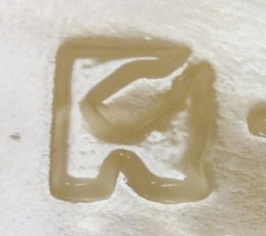 R trademark used by Richards Packaging. Photo courtesy of Irena Shein.