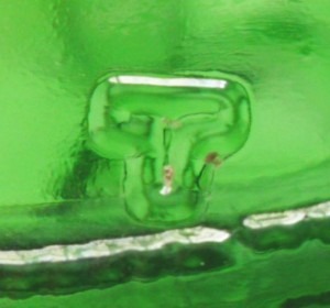 Glass Manufacturers Marks: T (Double-line font) used by Thatcher Glass c.1983-1985.