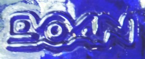 Doan mark on cobalt blue bottle