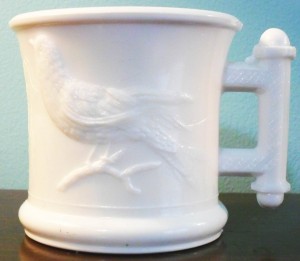 Eastlake ("Robin") pattern mug in white milkglass, circa 1880s-1890s. This is the 2-compartment Shaving Mug variant.