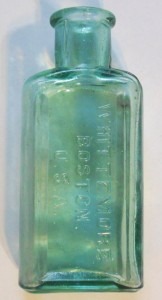 "Whittemore Boston U.S.A." bottle in green-aqua glass