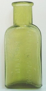 Whittemore Shoe Polish bottle in Citron colored glass