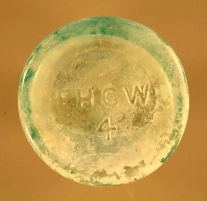 F H G W / 4 ~ Export Beer bottle base, from San Elizario TX excavation. (Photo courtesy Bill Lockhart)