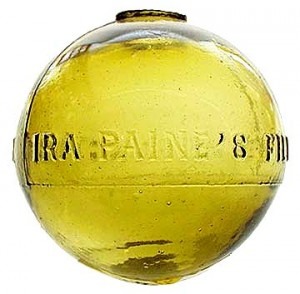 Glass Target Ball, marked "IRA PAINE'S FILLED BALL PAT OCT 23 1877" in yellow amber (photo courtesy of Glass Works Auctions).