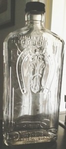 Spirits bottle with "Angular" Glass Containers, Inc. mark on base, as shown in accompanying pic. (Photo courtesy of Michael Aden).