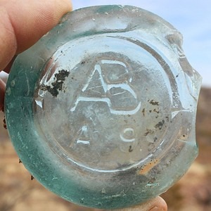 AB Connected aqua glass beer bottle: AB/ A 9 bottle base (photo courtesy Ernie Parks), found in Arizona.