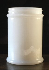 Milk glass cosmetic jar marked "JACIEL" on the base. (Photo courtesy of Melissa Pearson)