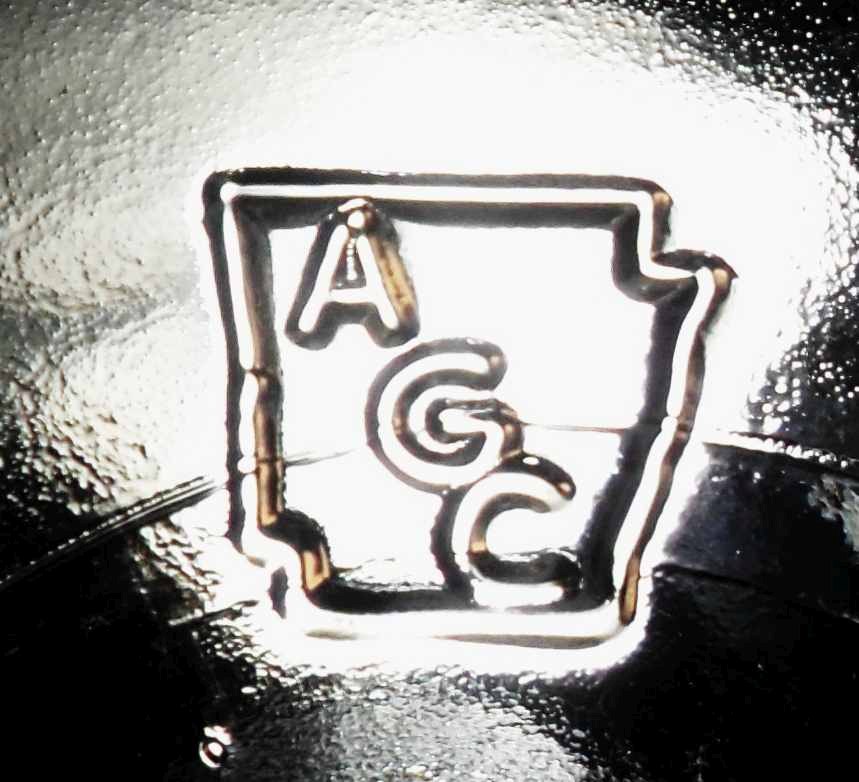 AGC inside map of Arkansas - mark used by Arkansas Glass Container Corporation- mark on base of glass packer jar.