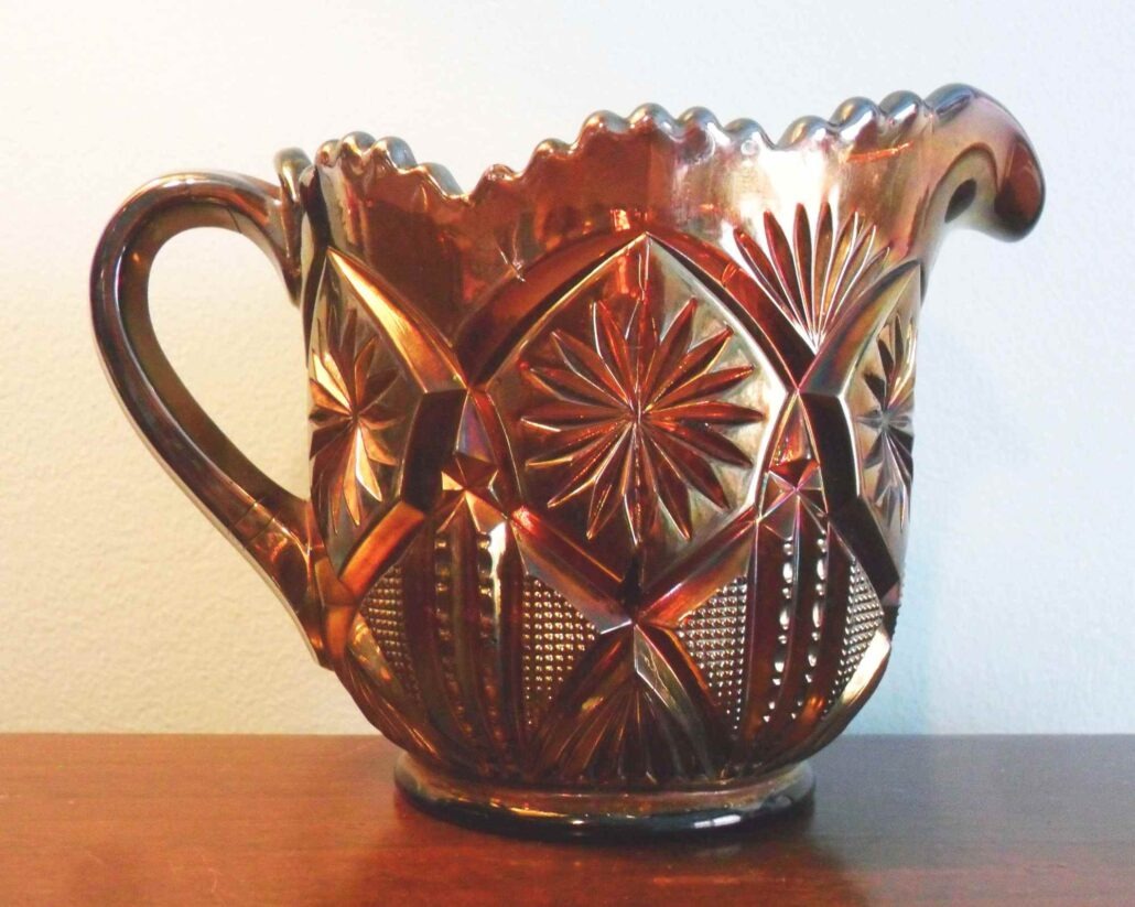 "Country Kitchen" pattern Carnival glass pitcher / creamer, made by Millersburg Glass Company Millersburg, Ohio circa 1909-1912.