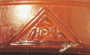 IPG inside triangle-used by Illinois-Pacific Glass Corporation - as seen on heel of amber Clorox bottle.