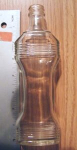 Front view of condiment bottle with "G.C.CO." mark on the base. (Photo courtesy of Anthony Herren).