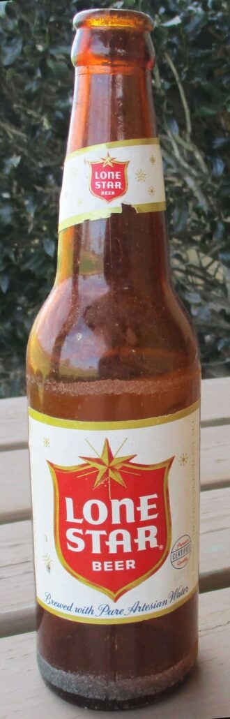 Lone Star amber beer bottle made by Maywood Glass Company, MG-connected mark. Photo courtesy of Don Nored.