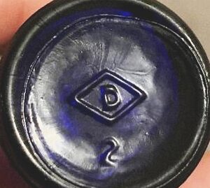 "D in a diamond"mark on base of Bromo Selter bottle made by Dominion Glass Company (Photo courtesy of Tyler Cazes)