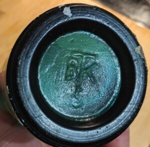 BTK marking on base of teal aqua-green bottle - photo courtesy of Eric Hulten