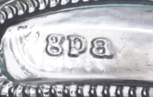 GPA Global - GPA mark seen on bottom of clear glass spirits flask for Jose Cuervo brand tequila. Bottle probably made in Mexico. 