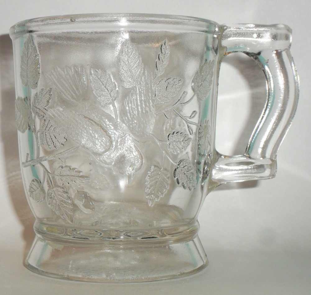 Bryce Bros or U.S. Glass "Robin in a Tree" mug in clear.