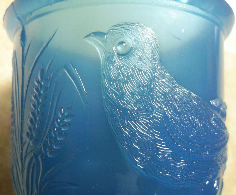 Closeup of bird on No. 3 size Blue Alabaster "EASTLAKE" mug made by Atterbury & Company of Pittsburgh