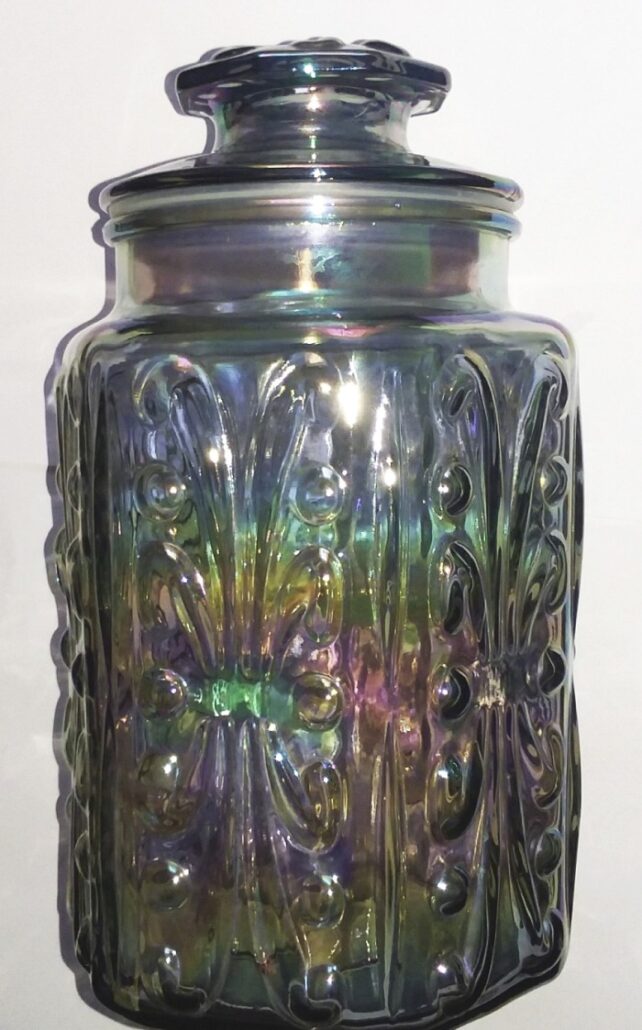 "Show off" kitchen storage jar / canister -kitchen counter jar made by Federal, in iridescent smoke colored glass. (Carnival glass).