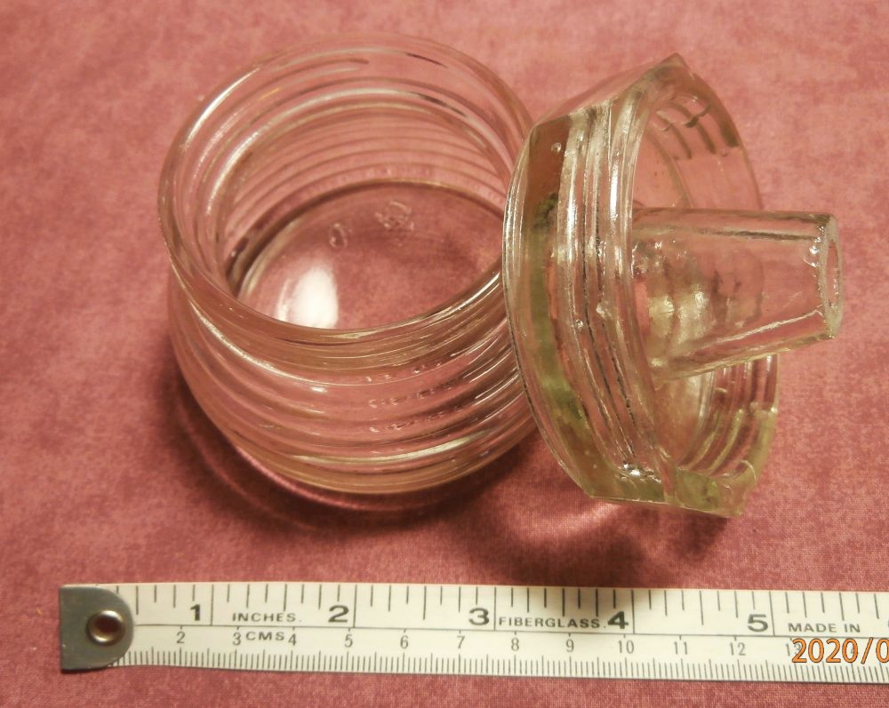 Unknown glass item, Photo #3. This is marked with the angular "GC" mark used by Glass Containers, Inc. (Photo courtesy of Diane Enns).