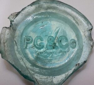 "P.G.& Co." on aqua glass base shard of aqua bottle or jar (so far - unidentified)