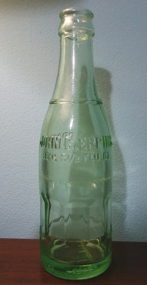 Light green JOHN G. EPPING - LOUISVILLE KY soda bottle made by Root Glass Company, Terre Haute, Indiana.