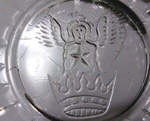 "Angel over Crown" logo on base of jelly glass made by Kerr Glass Manufacturing Corporation