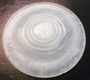 Boyd cap for zinc Mason jar lids - insert - semi translucent glass - unknown maker. Boyd cap for zinc Mason jar lids - insert - semi translucent glass - unknown maker.
