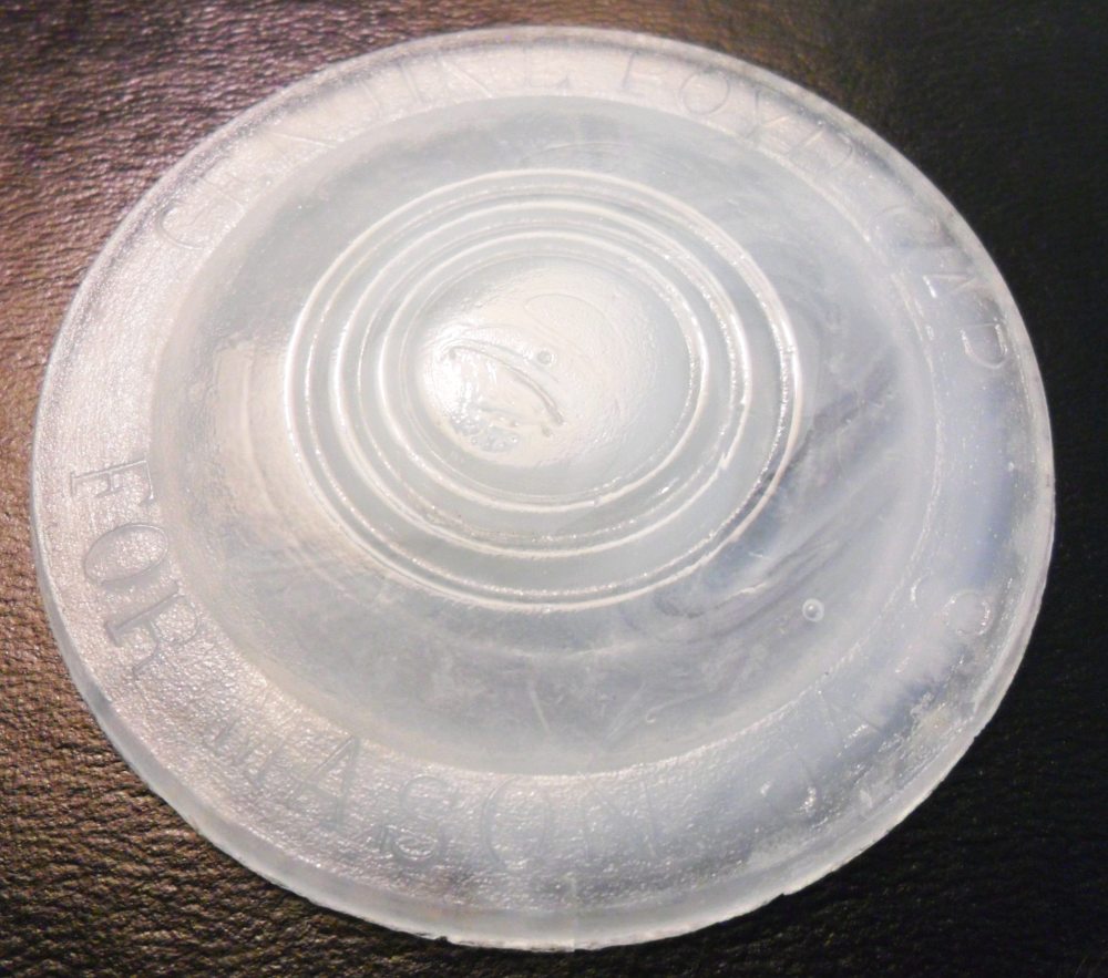 Boyd cap for zinc Mason jar lids - insert - semi translucent glass - unknown maker. 