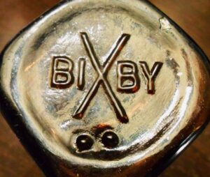 "Bixby" brand shoe polish bottle base - amber glass.