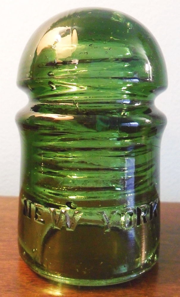 "BROOKFIELD / NEW YORK" embossed Yellow Green CD 102 "pony" insulator used on telephone lines.