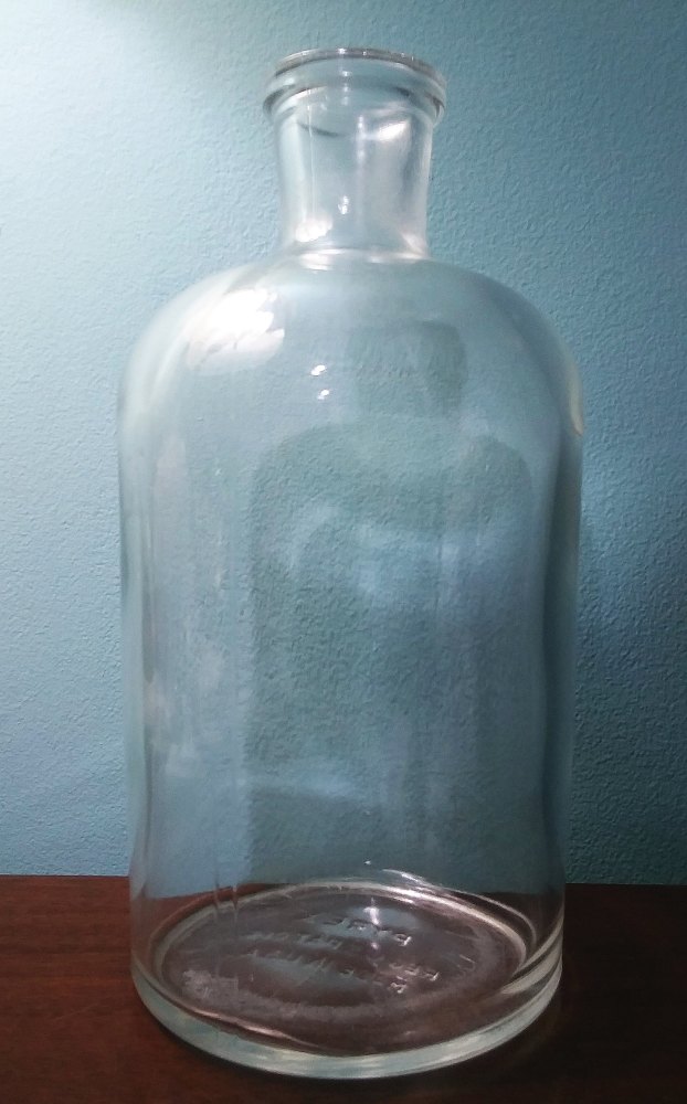 Typical Clear PYREX chemical / laboratory bottle. This one measures 8 inches in height.