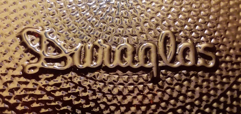 DURAGLAS trademark on base of amber glass jug that once contained bleach