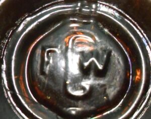 FGW mark on the base of small cylindrical utility bottle