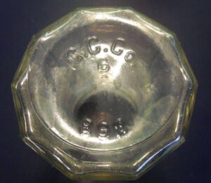 Base of G. C. Co. shaker or mustard jar with markings "G.C.Co", the number "6"  and the inventory number "890".