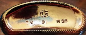 Base markings on Hillsboro Glass Company amber liquor flask made in 1991