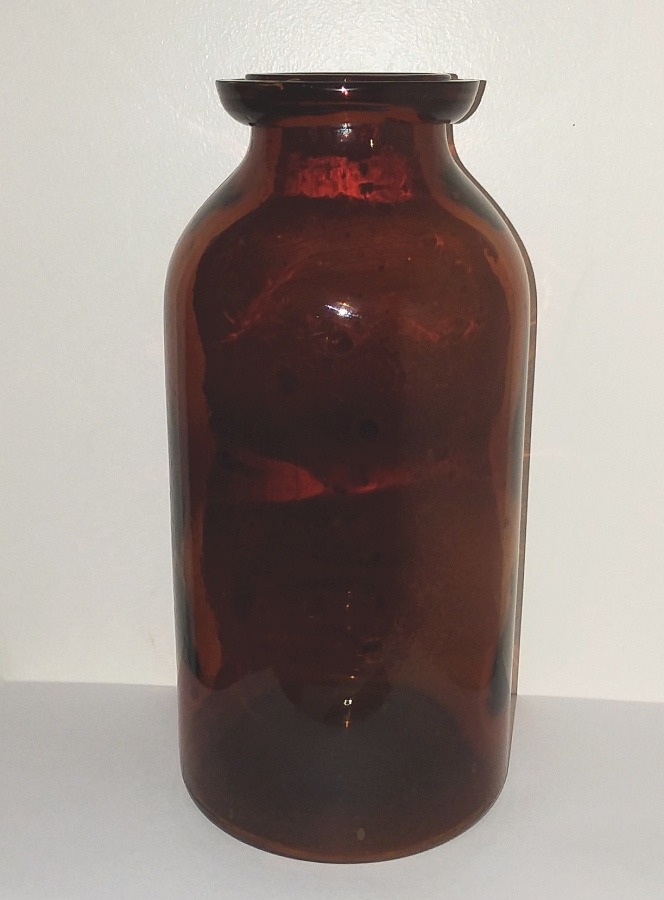 KYGWCo dark amber half gallon "wax sealer" fruit jar, made by Kentucky Glass Works Company.