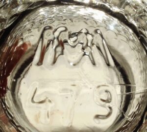 "MM" monogram on base of jam jar.  "479" mold or style number is placed below the logo. (Photo courtesy of Kath)