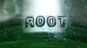 ROOT mark on lower heel area of light green John G Epping Louisville KY soda bottle - 1920s era.