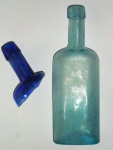 Aqua "Jamaica Ginger" style medicine or bluing bottle, and cobalt shard from same mold. Base-marked "S.G.W. LOU.KY."