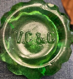 V C & C mark on base of green bottle - probably from Great Britain