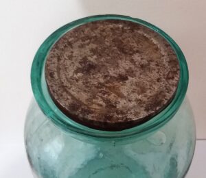 Wax sealer jar with metal lid in place. 