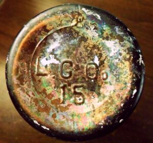 Lindell Glass Company - pint beer bottle base, heavily patinated.