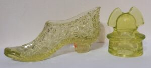 1880s Vaseline Glass shoe and mini commemorative "Roman Helmet" insulator in 'Canary" or Vaseline glass.