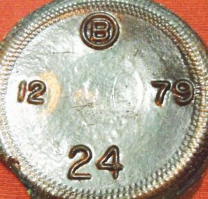 Brockway Glass Company - base of 1979 amber beer or soda bottle. The "12" plant number indicates this was made at their Zanesville, Ohio factory. The "24" is  a mold number.