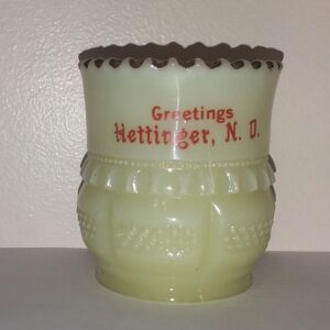 Custard Glass commemorative souvenir toothpick holder lettered "GREETINGS / HETTINGER, N. D." This is the "COLUMBIA" pattern made by Tarentum Glass Company of Tarentum, Pennsylvania.