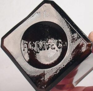 "F. G. MFG. Co." on base of amber Primley's Iron & Wahoo Tonic bottle (photo courtesy of Bill Lindsey)