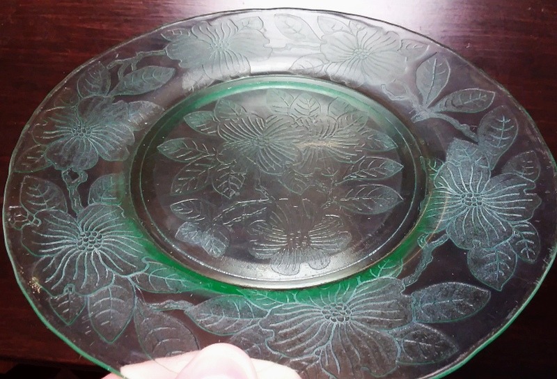 "DOGWOOD" pattern dessert or salad plate in green glass, made by MacBeth-Evans Glass Company, Charleroi, PA in the 1929-1932 period. This measures 8 inches in diameter. 